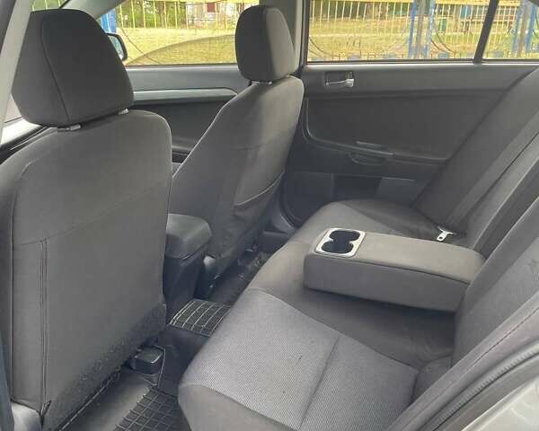 Сірий Міцубісі Lancer, об'ємом двигуна 2 л та пробігом 203 тис. км за 6500 $, фото 5 на Automoto.ua