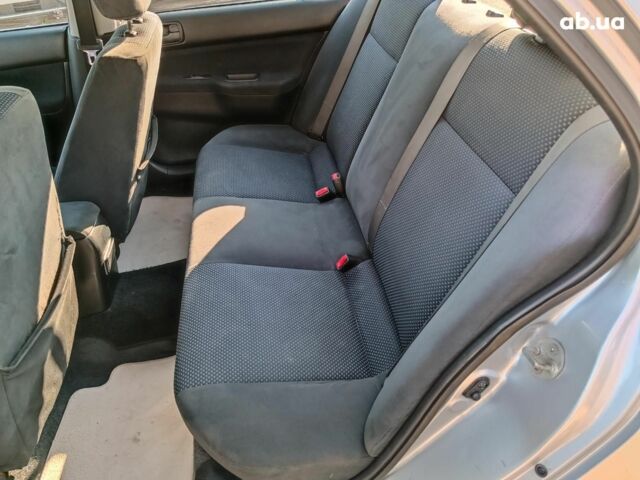 Сірий Міцубісі Lancer, об'ємом двигуна 1.6 л та пробігом 222 тис. км за 3990 $, фото 22 на Automoto.ua