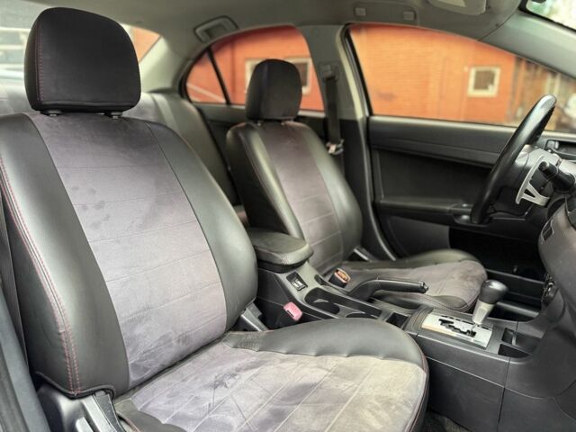 Сірий Міцубісі Lancer, об'ємом двигуна 2 л та пробігом 220 тис. км за 6400 $, фото 10 на Automoto.ua