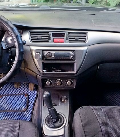 Сірий Міцубісі Lancer, об'ємом двигуна 1.6 л та пробігом 300 тис. км за 4400 $, фото 6 на Automoto.ua
