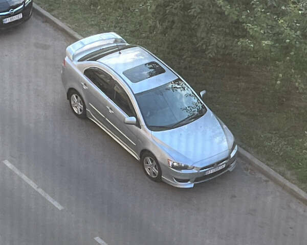 Сірий Міцубісі Lancer, об'ємом двигуна 2 л та пробігом 230 тис. км за 5500 $, фото 3 на Automoto.ua