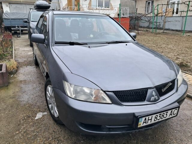 Сірий Міцубісі Lancer, об'ємом двигуна 0.16 л та пробігом 252 тис. км за 3600 $, фото 2 на Automoto.ua