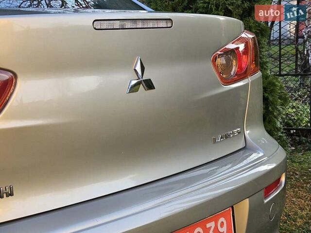 Серый Мицубиси Лансер, объемом двигателя 2 л и пробегом 282 тыс. км за 5450 $, фото 40 на Automoto.ua