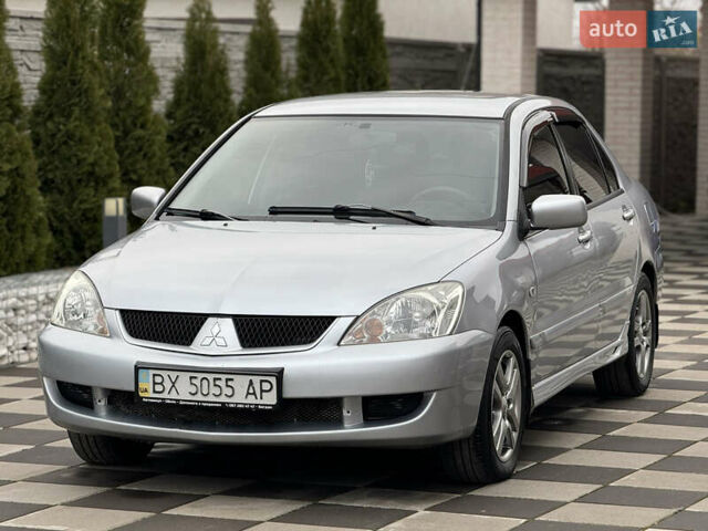 Сірий Міцубісі Lancer, об'ємом двигуна 1.6 л та пробігом 281 тис. км за 3999 $, фото 5 на Automoto.ua