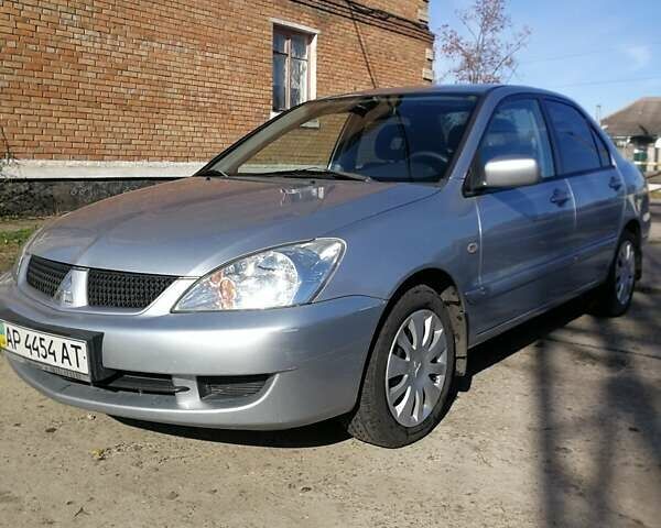 Сірий Міцубісі Lancer, об'ємом двигуна 1.6 л та пробігом 142 тис. км за 4700 $, фото 2 на Automoto.ua