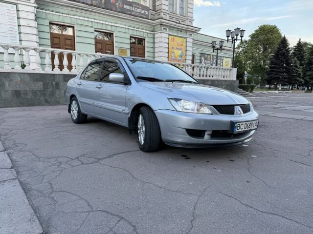 Сірий Міцубісі Lancer, об'ємом двигуна 0.16 л та пробігом 278 тис. км за 4700 $, фото 4 на Automoto.ua