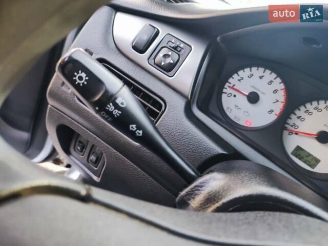 Сірий Міцубісі Lancer, об'ємом двигуна 1.58 л та пробігом 122 тис. км за 6300 $, фото 48 на Automoto.ua