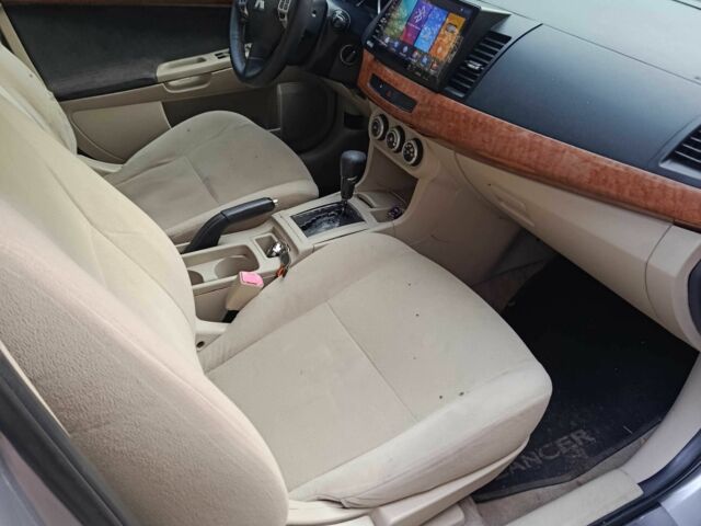 Сірий Міцубісі Lancer, об'ємом двигуна 1.5 л та пробігом 268 тис. км за 5935 $, фото 6 на Automoto.ua