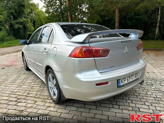 Серый Мицубиси Лансер, объемом двигателя 2 л и пробегом 250 тыс. км за 6000 $, фото 2 на Automoto.ua