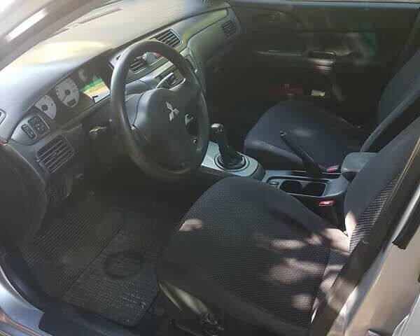 Серый Мицубиси Лансер, объемом двигателя 0 л и пробегом 236 тыс. км за 4500 $, фото 6 на Automoto.ua