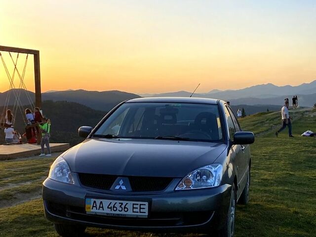Сірий Міцубісі Lancer, об'ємом двигуна 1.6 л та пробігом 240 тис. км за 4450 $, фото 5 на Automoto.ua