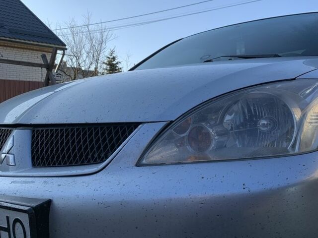 Сірий Міцубісі Lancer, об'ємом двигуна 1.6 л та пробігом 248 тис. км за 3000 $, фото 4 на Automoto.ua