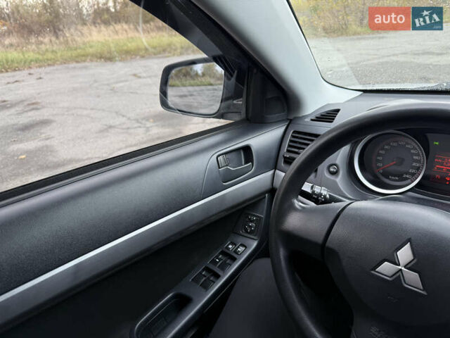 Серый Мицубиси Лансер, объемом двигателя 1.5 л и пробегом 97 тыс. км за 7300 $, фото 19 на Automoto.ua