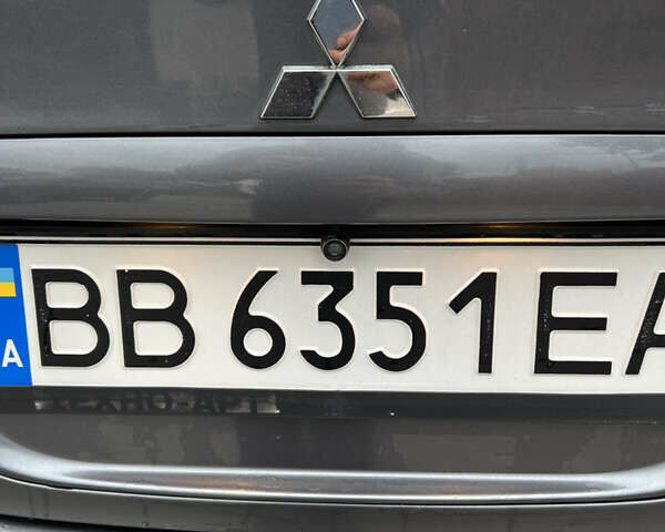 Сірий Міцубісі Lancer, об'ємом двигуна 1.58 л та пробігом 176 тис. км за 4700 $, фото 6 на Automoto.ua