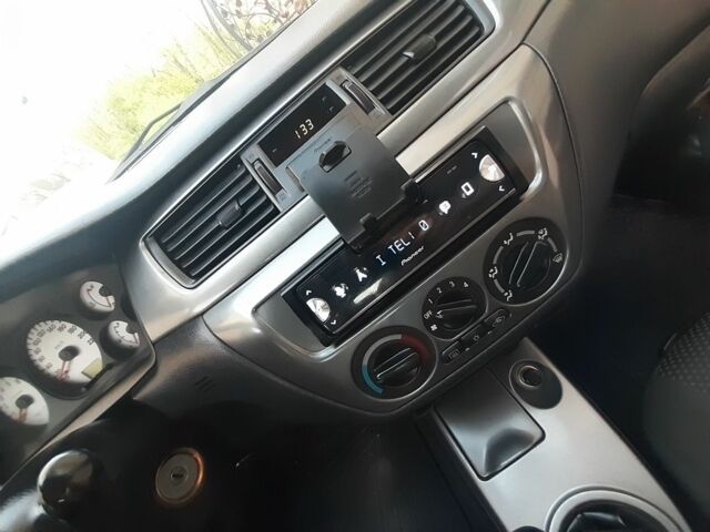 Сірий Міцубісі Lancer, об'ємом двигуна 1.5 л та пробігом 176 тис. км за 2950 $, фото 3 на Automoto.ua