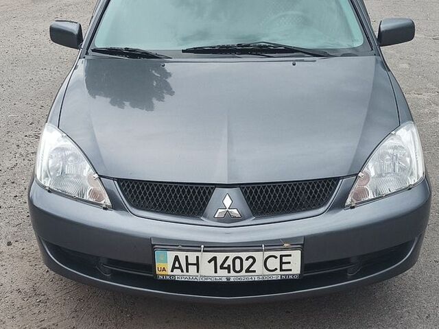 Сірий Міцубісі Lancer, об'ємом двигуна 1.58 л та пробігом 100 тис. км за 5700 $, фото 13 на Automoto.ua