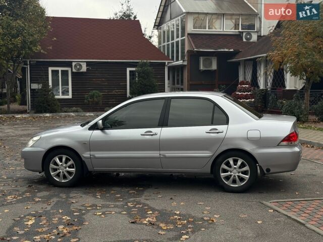 Сірий Міцубісі Lancer, об'ємом двигуна 1.6 л та пробігом 185 тис. км за 4499 $, фото 8 на Automoto.ua