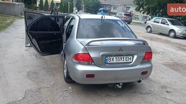 Сірий Міцубісі Lancer, об'ємом двигуна 1.6 л та пробігом 298 тис. км за 4100 $, фото 5 на Automoto.ua