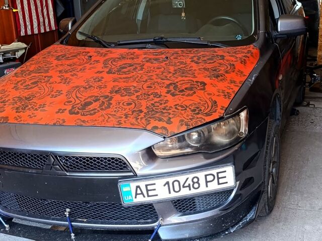 Серый Мицубиси Лансер, объемом двигателя 1.5 л и пробегом 220 тыс. км за 5200 $, фото 4 на Automoto.ua