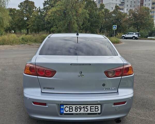 Серый Мицубиси Лансер, объемом двигателя 1.5 л и пробегом 235 тыс. км за 5000 $, фото 4 на Automoto.ua