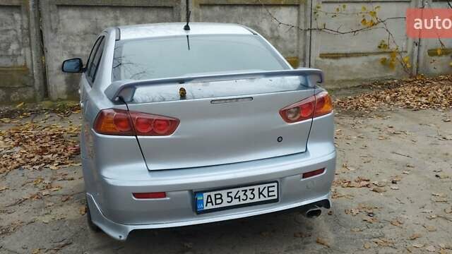 Серый Мицубиси Лансер, объемом двигателя 2 л и пробегом 305 тыс. км за 6300 $, фото 8 на Automoto.ua