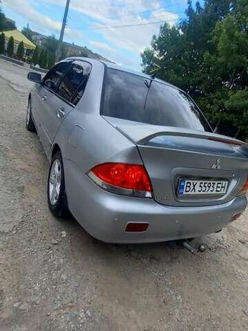 Сірий Міцубісі Lancer, об'ємом двигуна 1.6 л та пробігом 298 тис. км за 4100 $, фото 2 на Automoto.ua