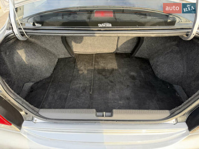 Серый Мицубиси Лансер, объемом двигателя 1.3 л и пробегом 160 тыс. км за 5555 $, фото 84 на Automoto.ua