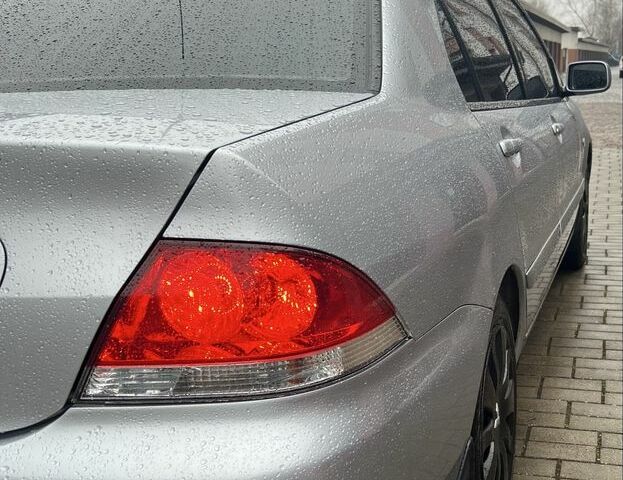 Сірий Міцубісі Lancer, об'ємом двигуна 1.6 л та пробігом 272 тис. км за 4500 $, фото 5 на Automoto.ua