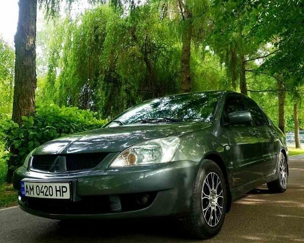 Сірий Міцубісі Lancer, об'ємом двигуна 1.58 л та пробігом 220 тис. км за 4500 $, фото 2 на Automoto.ua