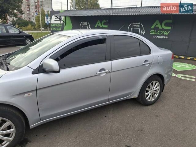 Серый Мицубиси Лансер, объемом двигателя 1.5 л и пробегом 235 тыс. км за 5000 $, фото 10 на Automoto.ua