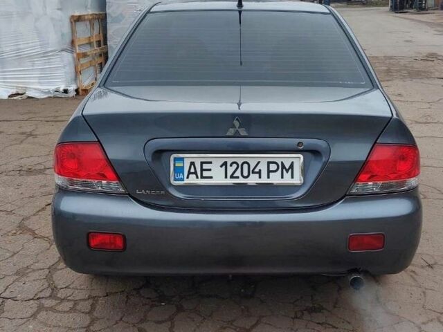 Серый Мицубиси Лансер, объемом двигателя 1.6 л и пробегом 220 тыс. км за 4200 $, фото 3 на Automoto.ua