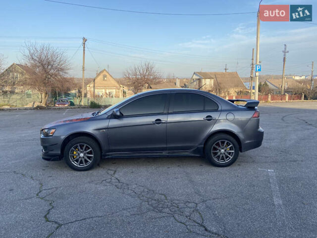 Серый Мицубиси Лансер, объемом двигателя 1.5 л и пробегом 224 тыс. км за 6300 $, фото 7 на Automoto.ua