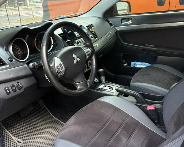 Сірий Міцубісі Lancer, об'ємом двигуна 2 л та пробігом 298 тис. км за 5600 $, фото 7 на Automoto.ua