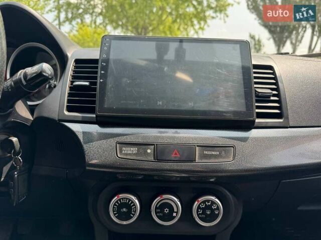 Сірий Міцубісі Lancer, об'ємом двигуна 2 л та пробігом 149 тис. км за 6798 $, фото 19 на Automoto.ua