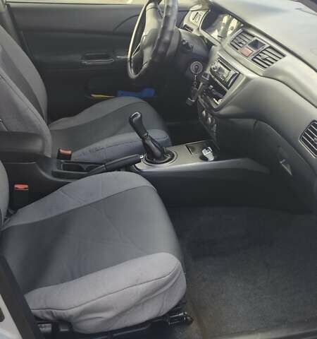 Серый Мицубиси Лансер, объемом двигателя 1.6 л и пробегом 205 тыс. км за 4500 $, фото 7 на Automoto.ua