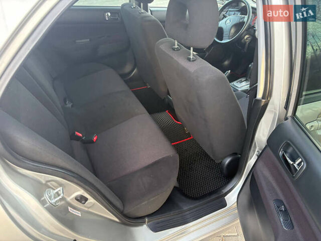 Серый Мицубиси Лансер, объемом двигателя 2 л и пробегом 184 тыс. км за 4900 $, фото 6 на Automoto.ua