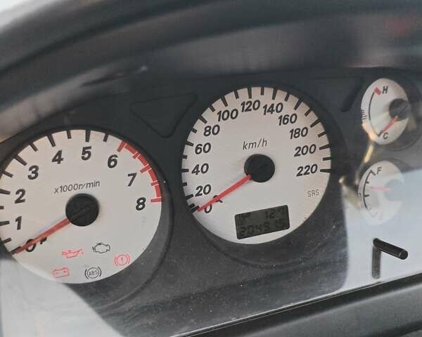 Серый Мицубиси Лансер, объемом двигателя 1.6 л и пробегом 210 тыс. км за 3500 $, фото 12 на Automoto.ua