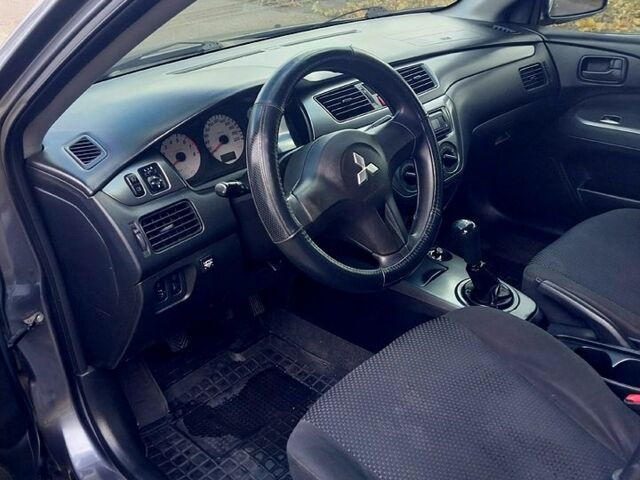 Сірий Міцубісі Lancer, об'ємом двигуна 1.6 л та пробігом 229 тис. км за 4500 $, фото 10 на Automoto.ua