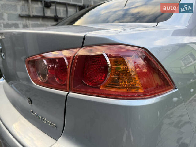 Міцубісі Lancer 2007 у Житомирі на Automoto.ua Сірий Міцубісі Lancer, об'ємом двигуна 1.5 л та пробігом 195 тис. км за 5700 $, фото 49 на Automoto.ua