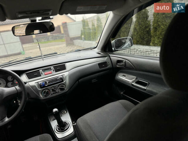 Сірий Міцубісі Lancer, об'ємом двигуна 1.6 л та пробігом 281 тис. км за 3999 $, фото 20 на Automoto.ua
