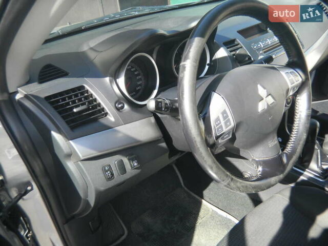 Сірий Міцубісі Lancer, об'ємом двигуна 2 л та пробігом 103 тис. км за 7300 $, фото 6 на Automoto.ua