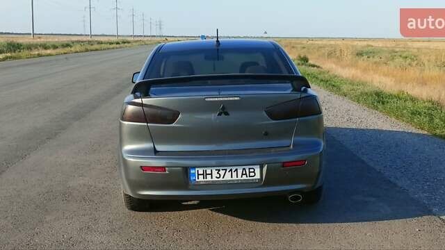 Сірий Міцубісі Lancer, об'ємом двигуна 2 л та пробігом 240 тис. км за 9500 $, фото 1 на Automoto.ua