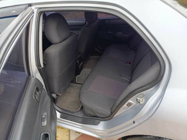 Серый Мицубиси Лансер, объемом двигателя 1.6 л и пробегом 238 тыс. км за 2900 $, фото 4 на Automoto.ua