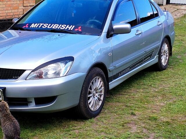 Сірий Міцубісі Lancer, об'ємом двигуна 1.6 л та пробігом 280 тис. км за 4800 $, фото 1 на Automoto.ua