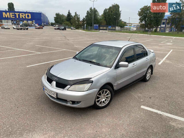 Мицубиси Лансер 2007 в Житомире на Automoto.ua Серый Мицубиси Лансер, объемом двигателя 1.6 л и пробегом 281 тыс. км за 3500 $, фото 8 на Automoto.ua