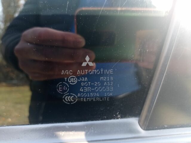 Серый Мицубиси Лансер, объемом двигателя 2 л и пробегом 180 тыс. км за 5800 $, фото 2 на Automoto.ua