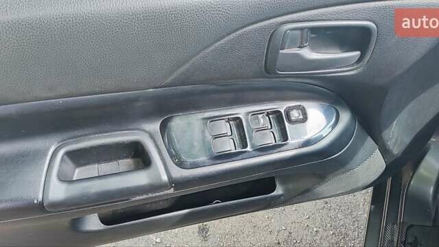 Сірий Міцубісі Lancer, об'ємом двигуна 1.6 л та пробігом 234 тис. км за 4500 $, фото 5 на Automoto.ua