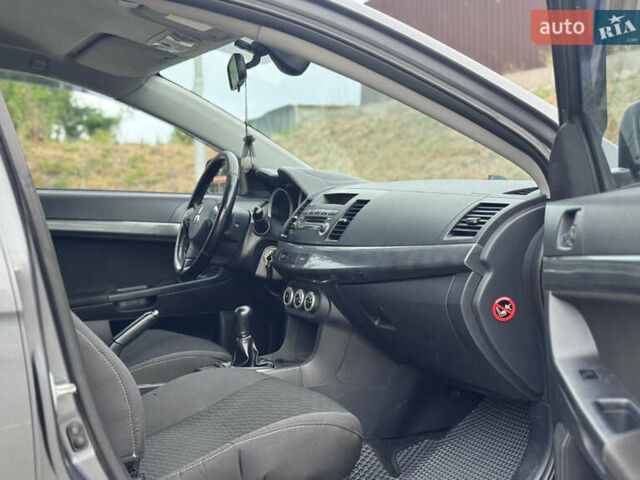 Сірий Міцубісі Lancer, об'ємом двигуна 2 л та пробігом 222 тис. км за 6300 $, фото 18 на Automoto.ua