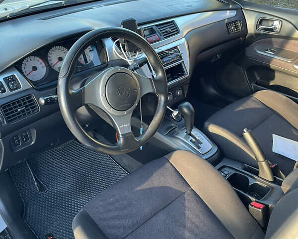 Мицубиси Лансер 2007 в Василькове на Automoto.ua Серый Мицубиси Лансер, объемом двигателя 2 л и пробегом 177 тыс. км за 5399 $, фото 13 на Automoto.ua