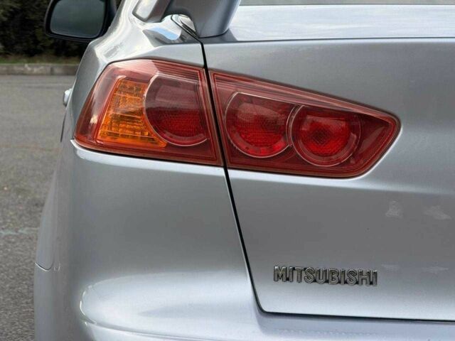 Серый Мицубиси Лансер, объемом двигателя 2 л и пробегом 207 тыс. км за 5800 $, фото 10 на Automoto.ua